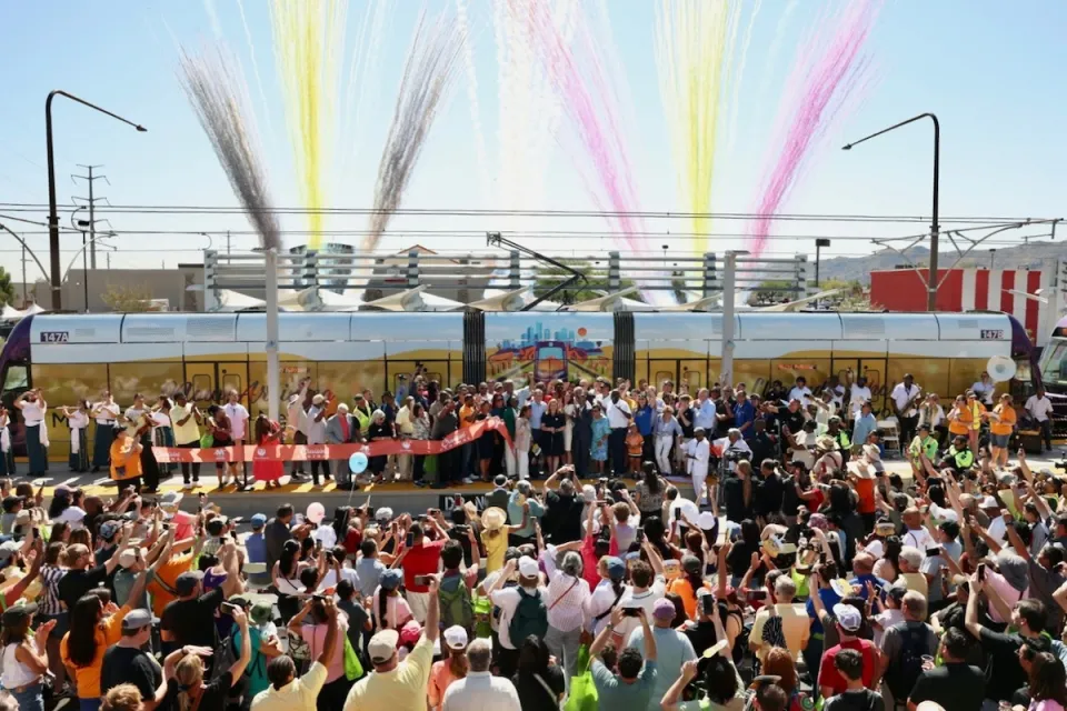 Crowd gathered at train station for grand opening of South Central Extension/Downtown Hub in Phoenix, Arizona.